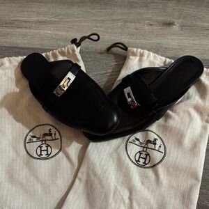 Hermès Black Leather Loafers with Silver Accent